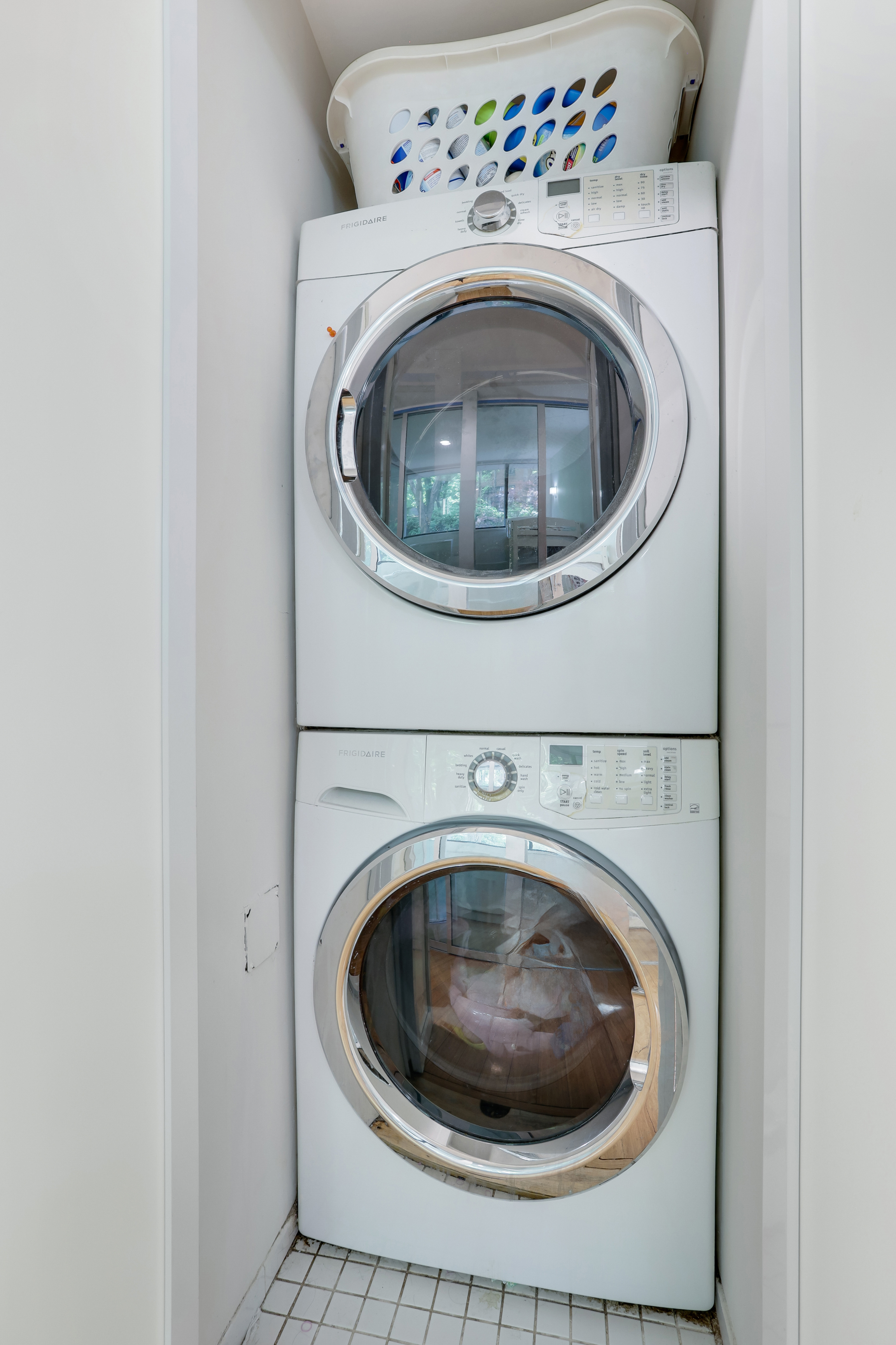 344 West 23rd Street, Unit 1E Manhattan, NY 10011 - Photo 17 of 18 a utility room with dryer and washer