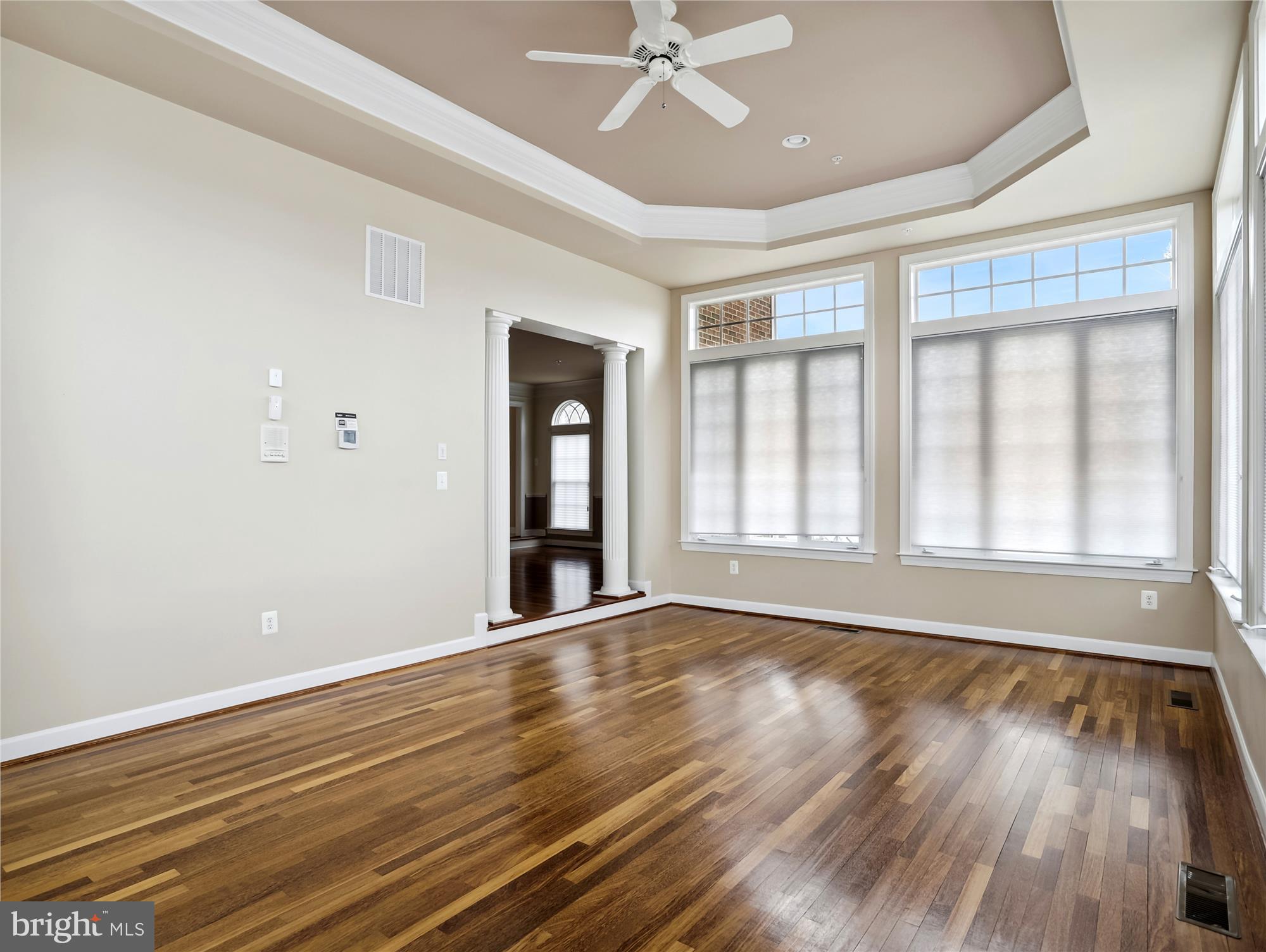 14302 Derby Ridge Road Bowie, MD 20721 - Photo 29 of 67 a view of an empty room with wooden floor and a window