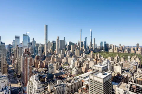 a view of a city with tall buildings