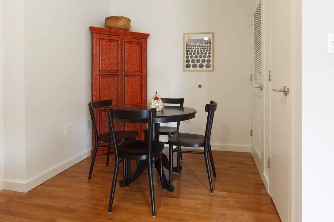 22 Caton Place, Unit 4H Brooklyn, NY 11218 - Photo 7 of 20 a view of a dining room with furniture and wooden floor