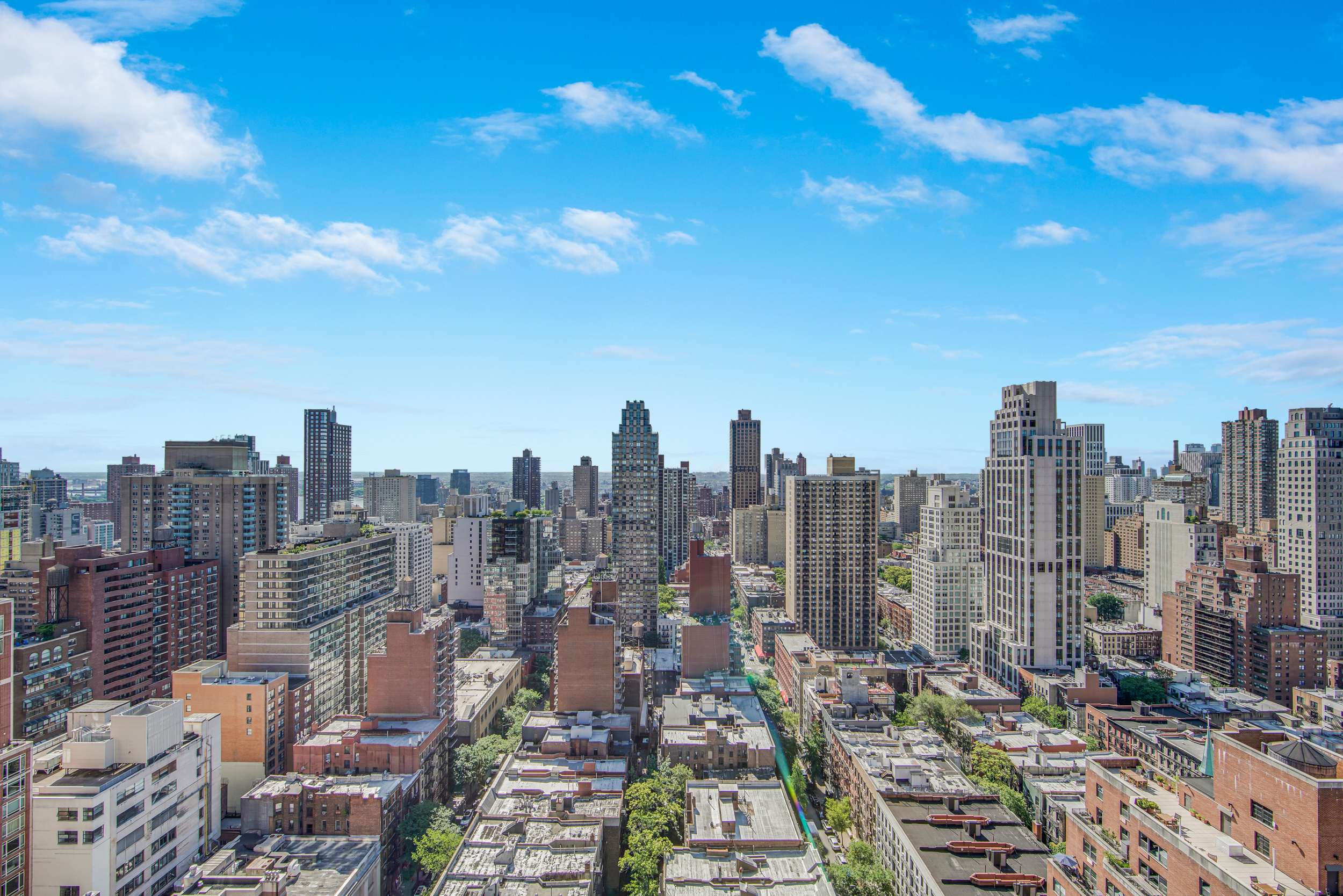 171 East 84th Street, Unit 31C Manhattan, NY 10028 - Photo 15 of 18 a view of a city with tall buildings