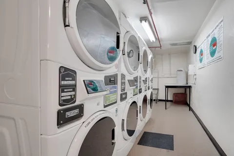 a view of livingroom with washer and dryer