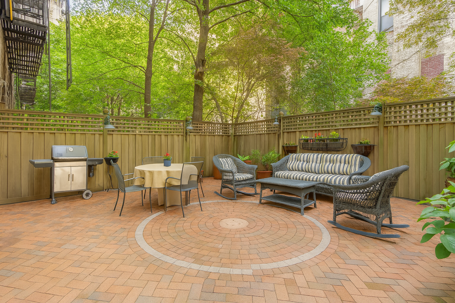 517 East 87th Street, Unit 1 Manhattan, NY 10128 - Photo 11 of 17 a terrace with outdoor seating and trees
