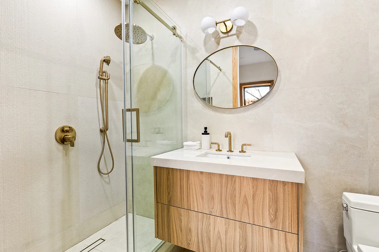 a bathroom with a sink a mirror and a shower