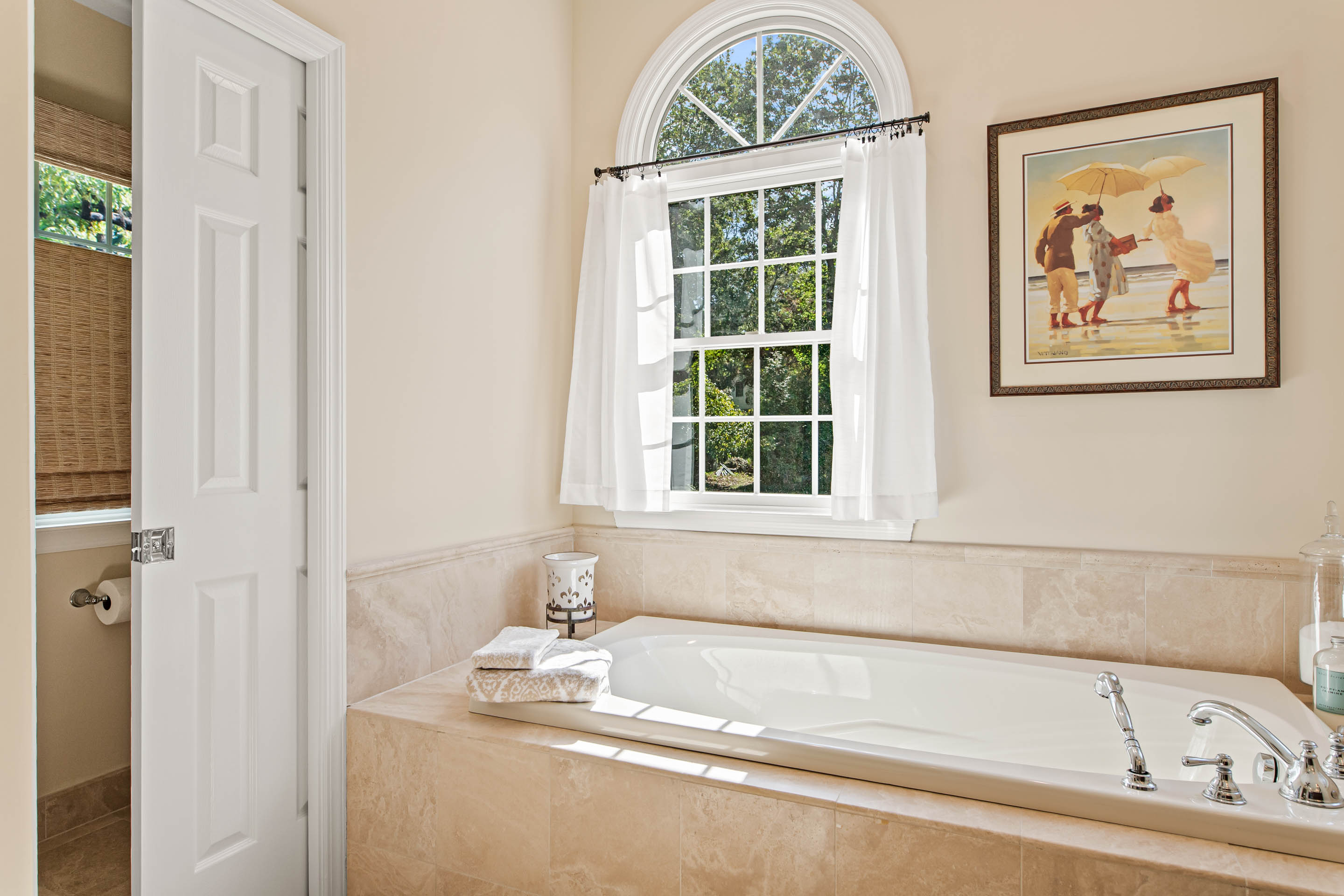 1136 Seaton Ross Road Wayne, PA 19087 - Photo 27 of 48 a bathroom with a tub and a window