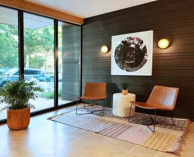 a view of a hallway with a refrigerator