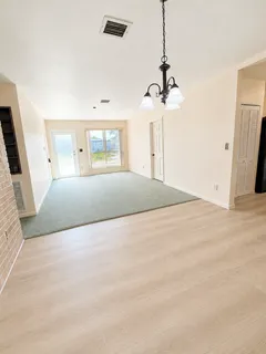 a view of a livingroom with a fireplace