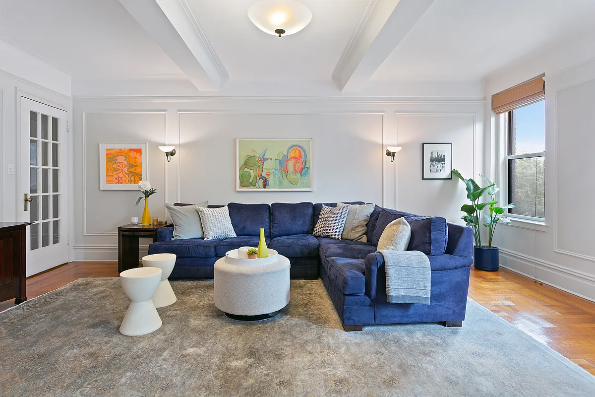 415 Central Park West, Unit 6A Manhattan, NY 10025 - Photo 3 of 25 a living room with furniture and a potted plant