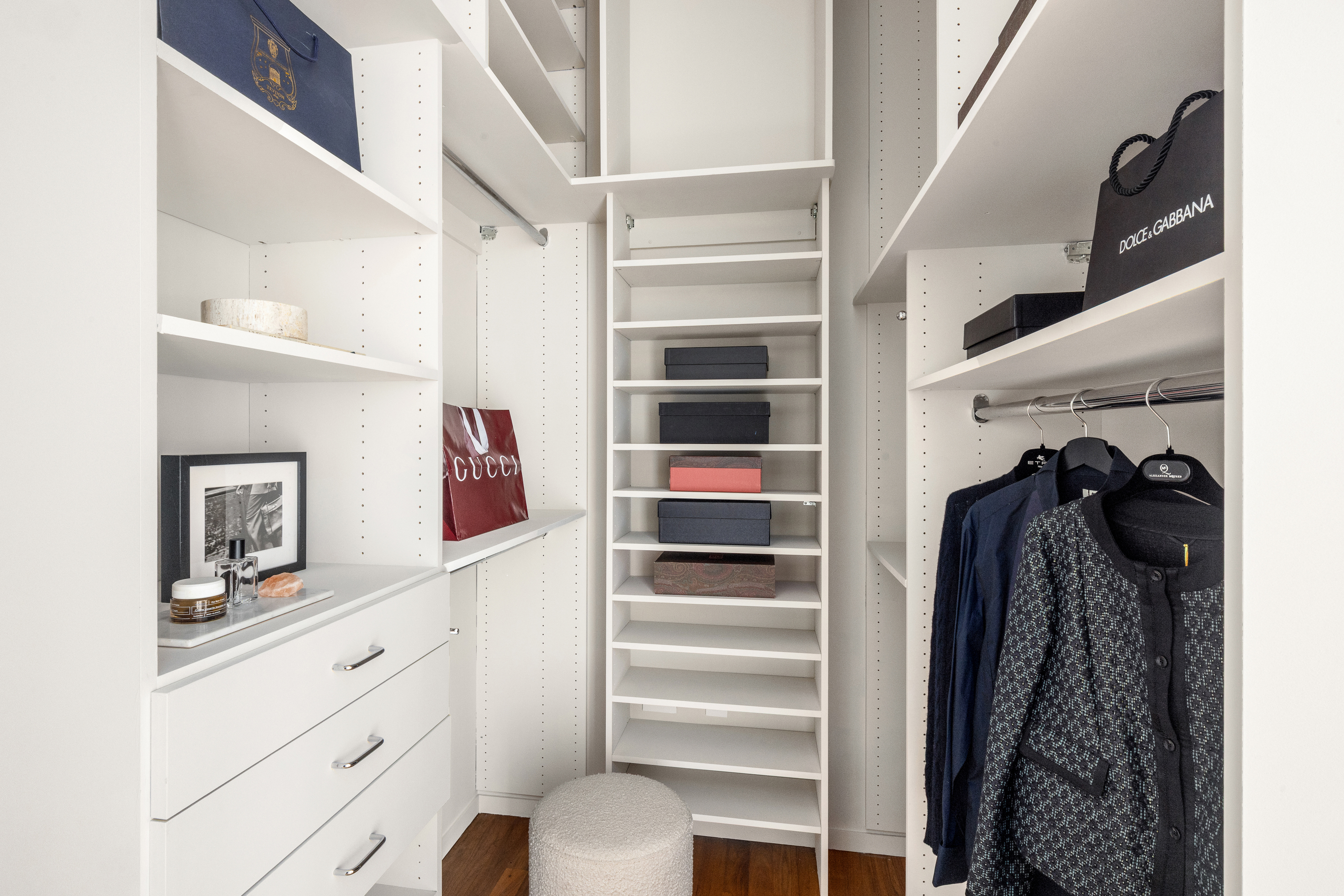 175 East Broadway, Unit 7A Manhattan, NY 10002 - Photo 17 of 24 a view of walk in closet with clothes and shoes