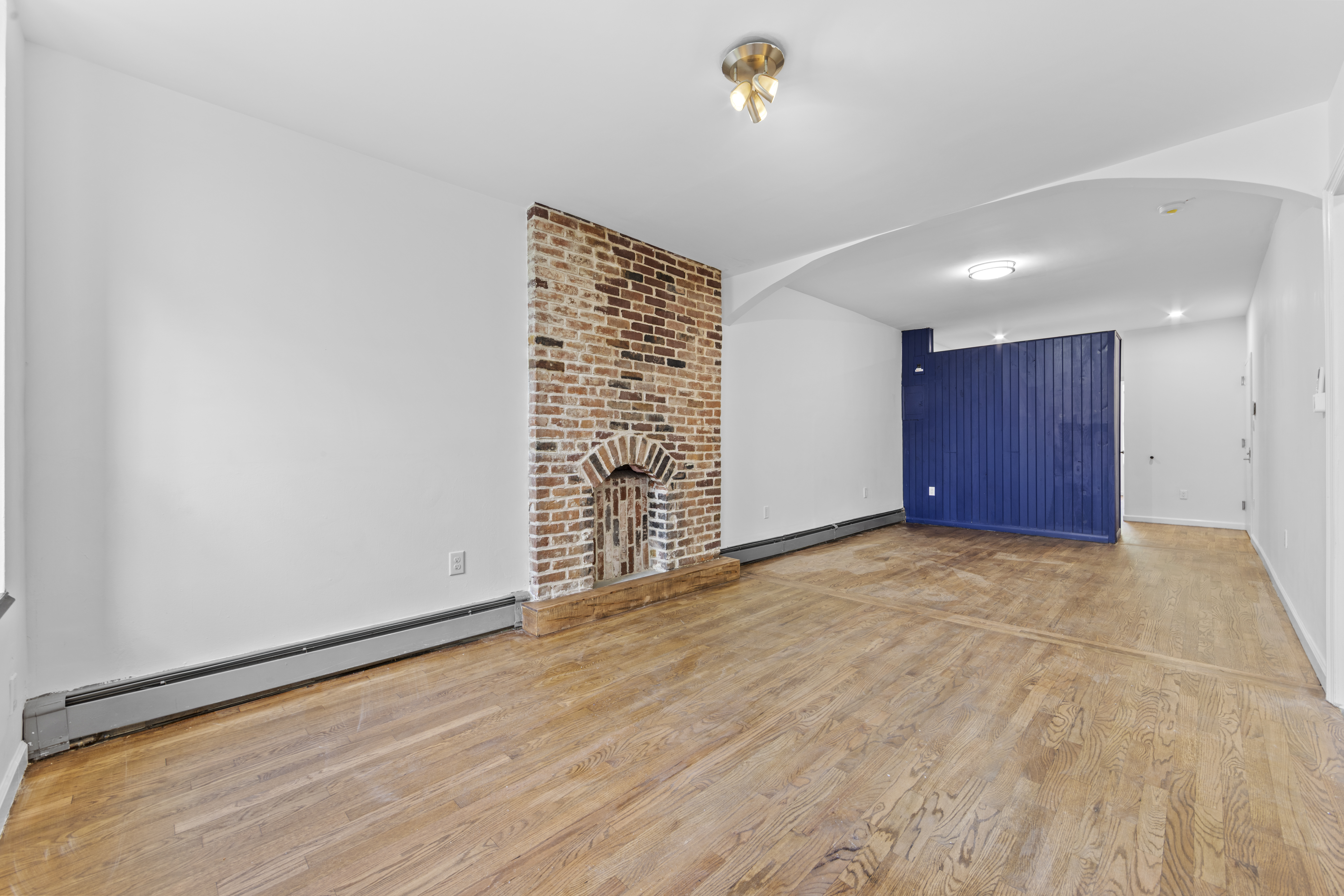 1061 Fulton Street, Unit 3 Brooklyn, NY 11238 - Photo 4 of 14 a view of an empty room with a closet