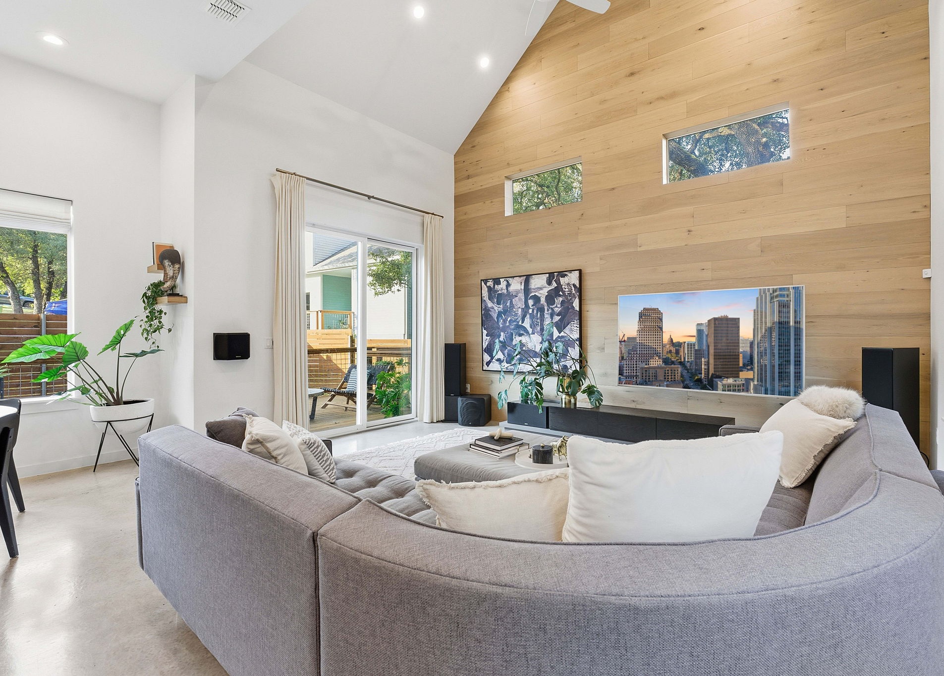 3001 Del Curto Road, Unit 10 Austin, TX 78704 - Photo 5 of 44 a living room with furniture and a large window