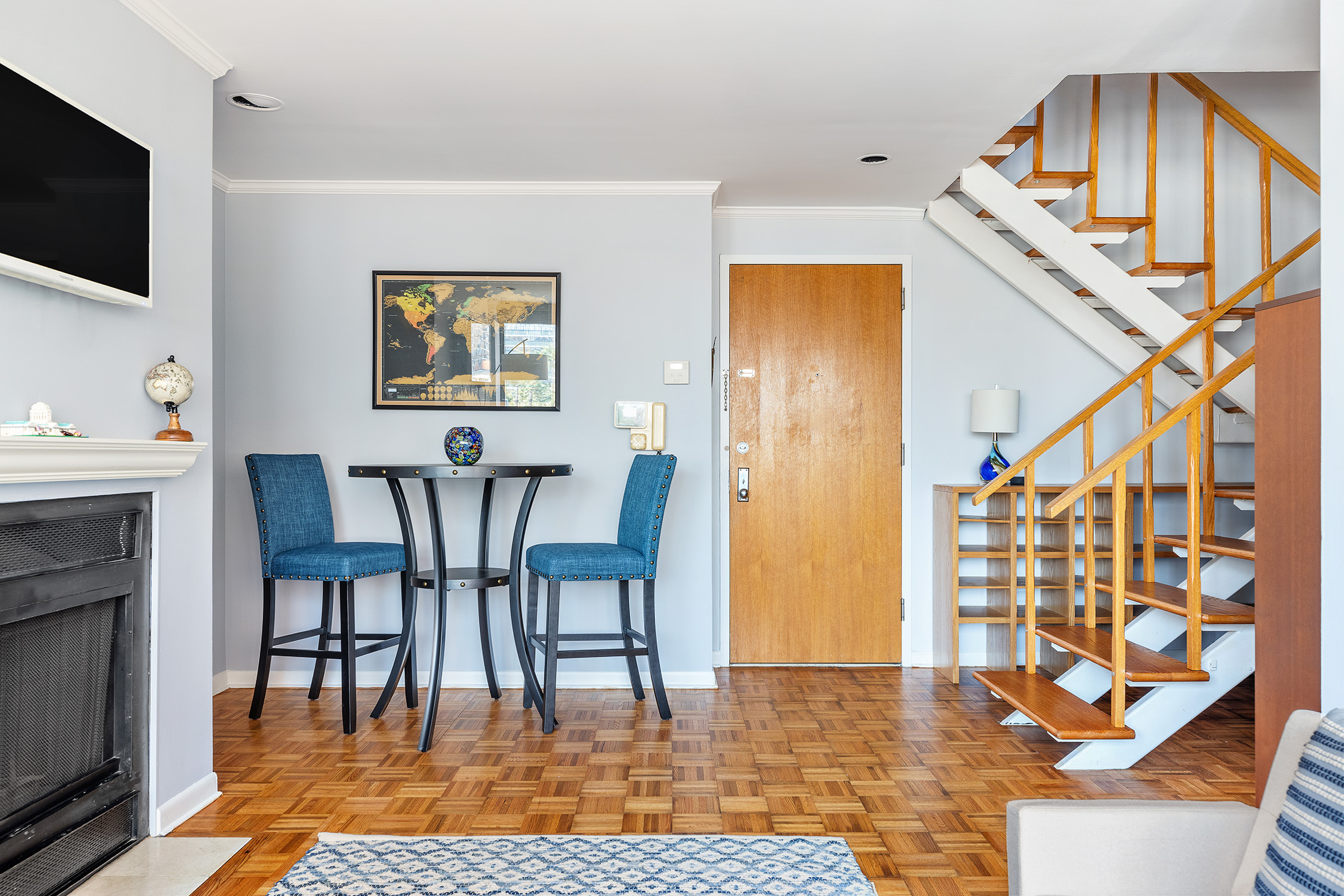 300 East 90th Street, Unit 7C Manhattan, NY 10128 - Photo 3 of 12 a view of a livingroom with furniture and a flat screen tv