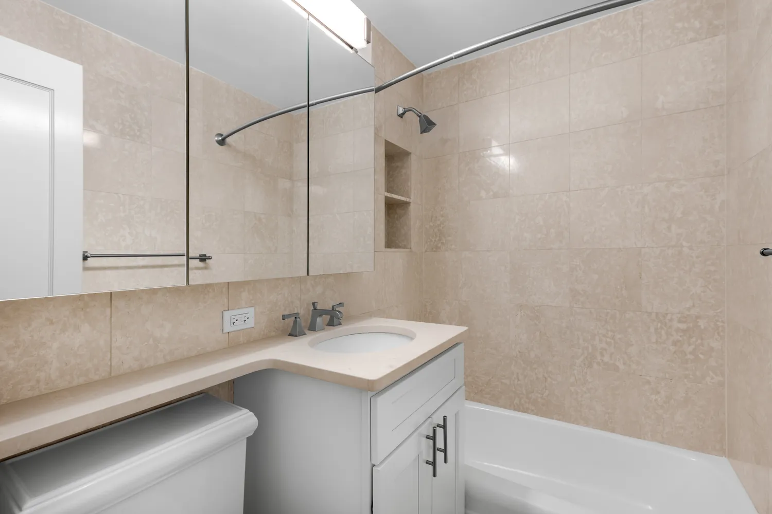 a bathroom with a sink and a bathtub