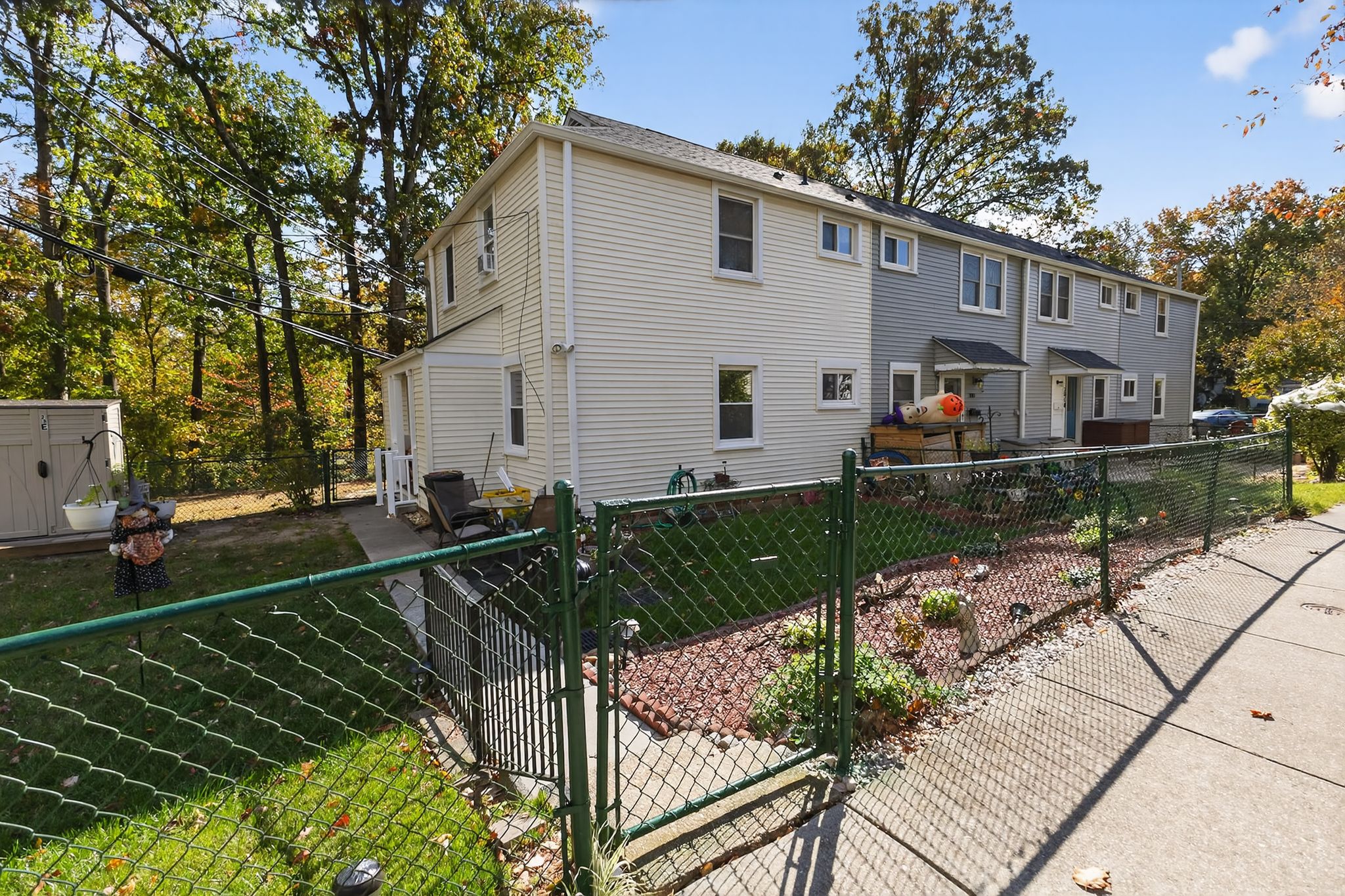 20 F Hillside Road Greenbelt, MD 20770 - Photo 4 of 4 a view of a house with backyard and sitting area