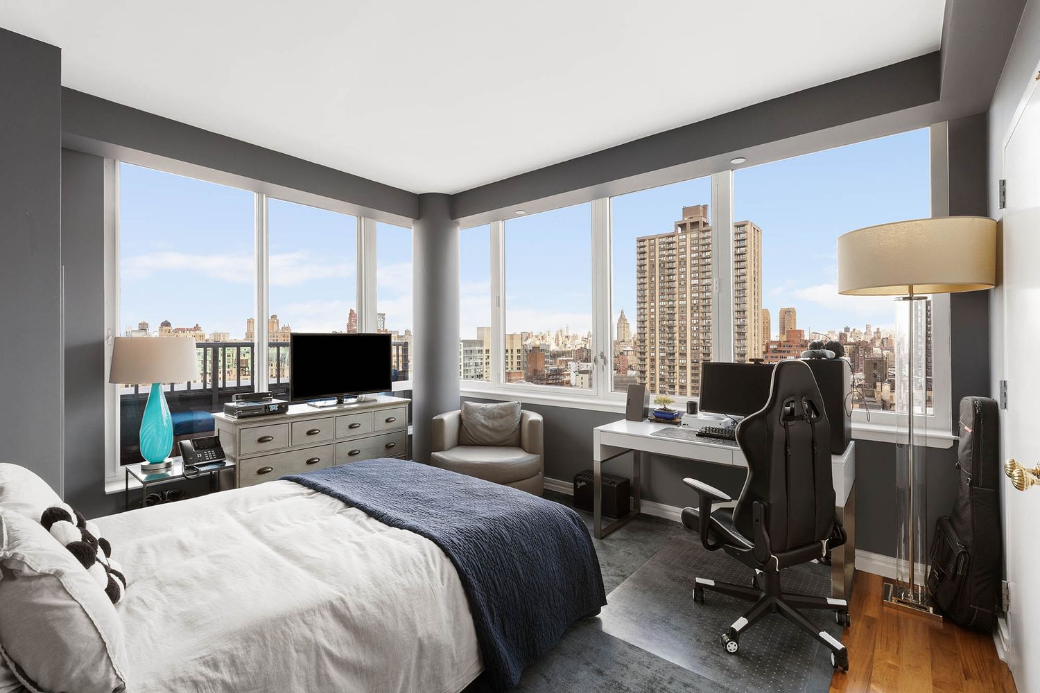 200 West End Avenue, Unit PHA Manhattan, NY 10023 - Photo 13 of 30 a bedroom with a bed and large windows