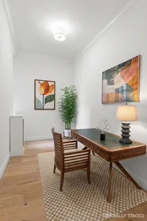 a room with furniture and wooden floor