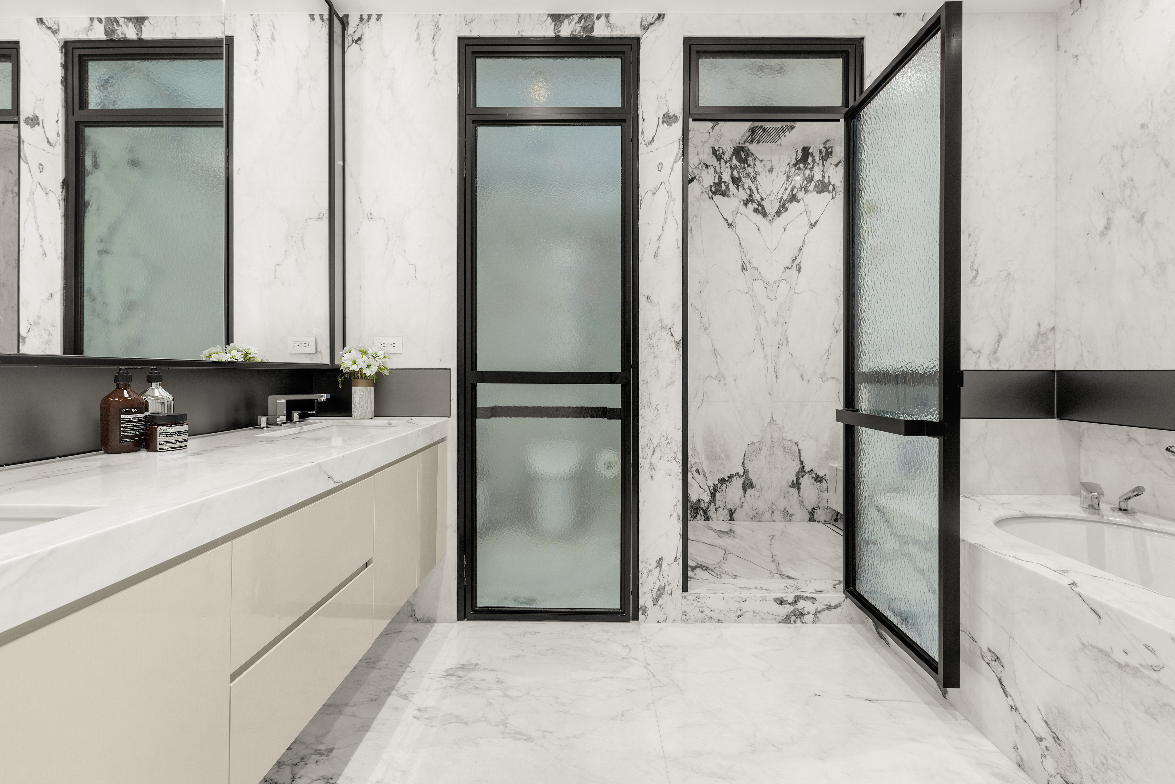 11 Beach Street, Unit THA Manhattan, NY 10013 - Photo 12 of 29 a bathroom with a bathtub and a double vanity sink