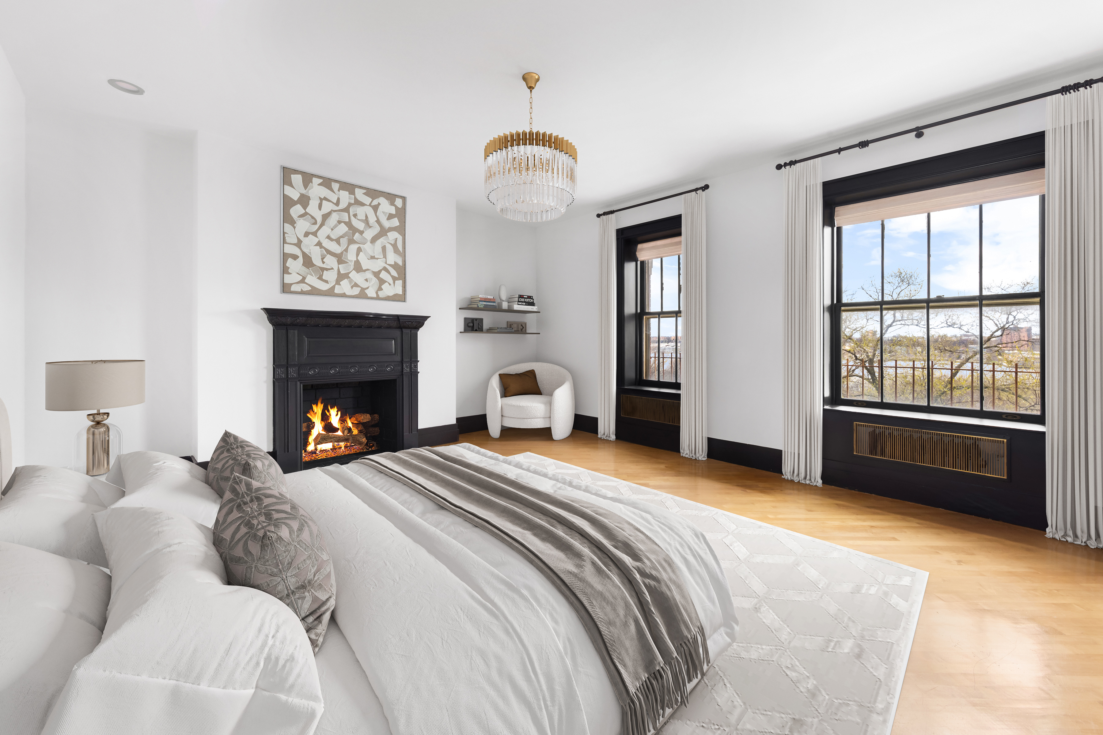 337 Riverside Drive Manhattan, NY 10025 - Photo 21 of 32 a bedroom with a bed and a fireplace