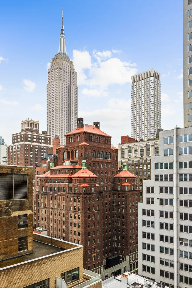 a view of a city with tall buildings