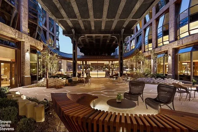 a view of a building with sitting area