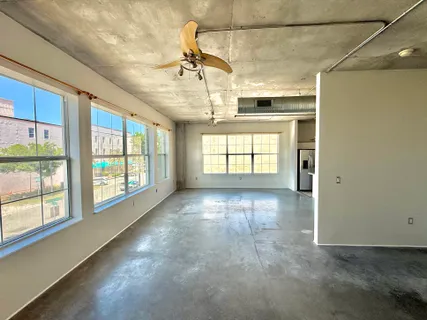 an empty room with windows