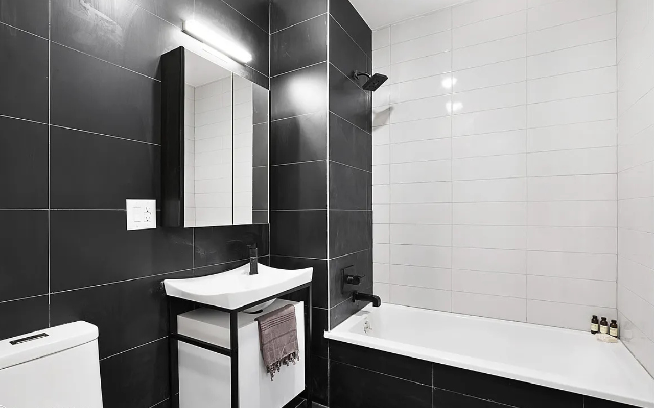 Saint Marks Avenue Brooklyn, NY 11213 - Photo 11 of 16 a bathroom with a sink toilet and shower