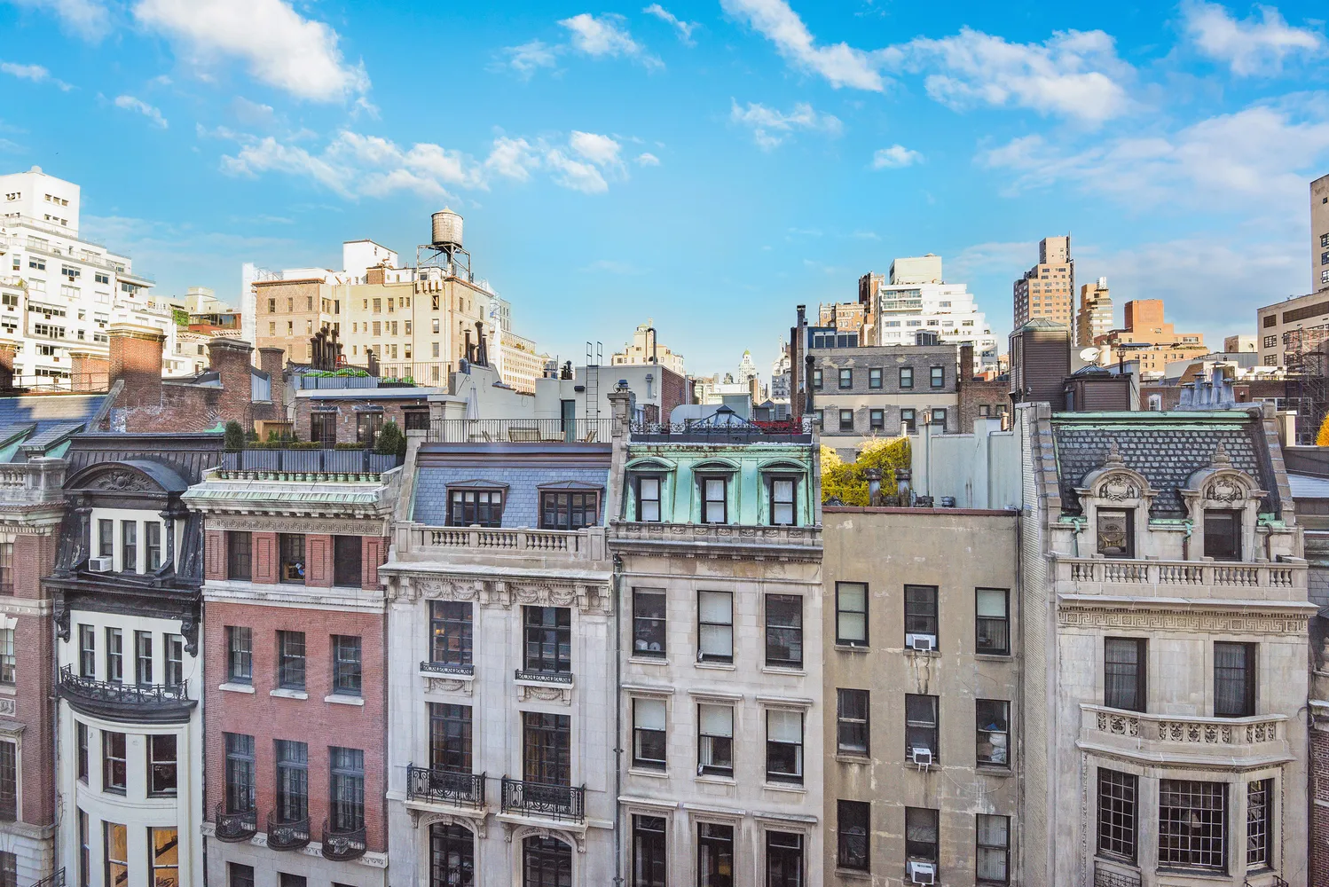 a view of a city with tall buildings