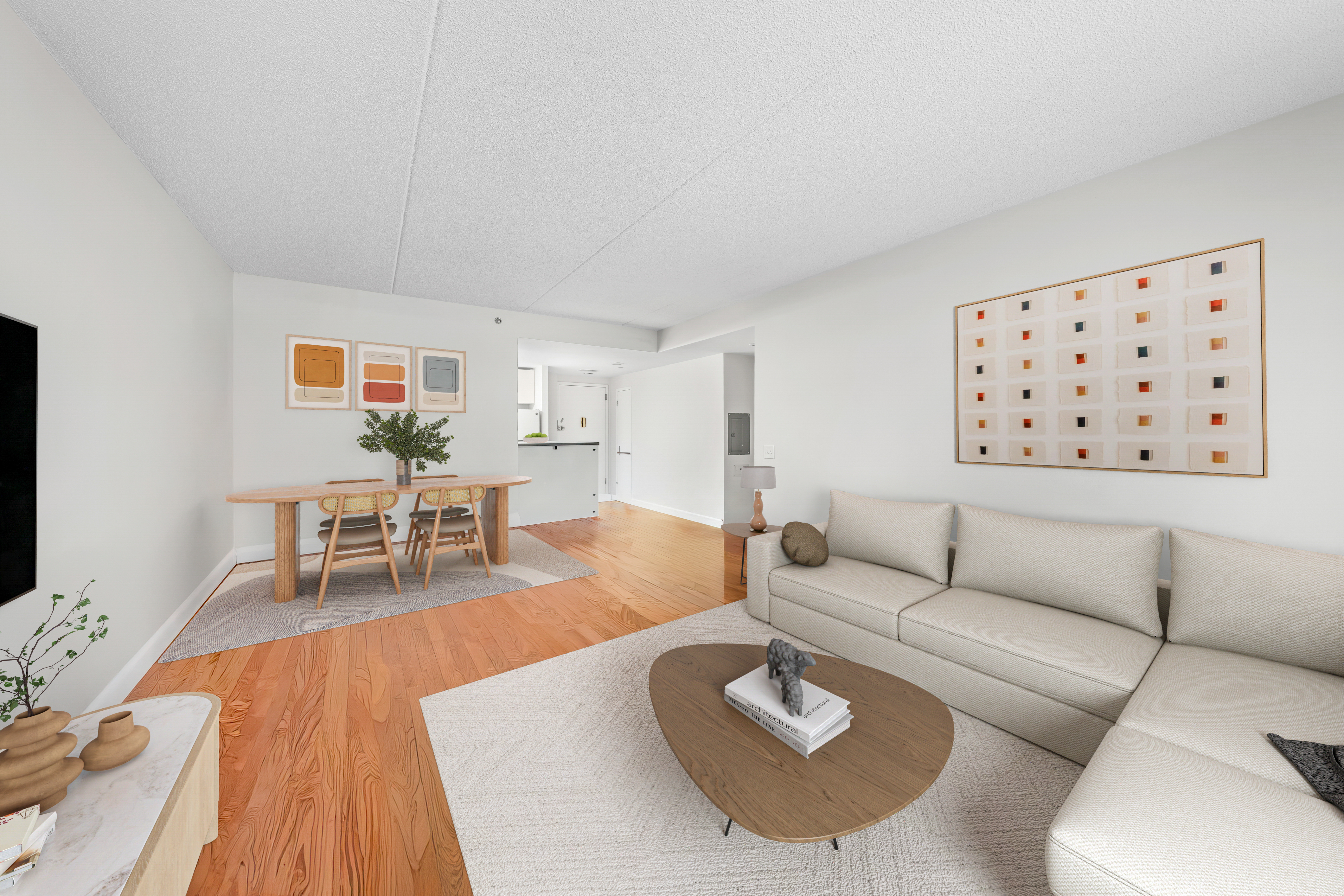 40 West 116th Street, Unit B301 Manhattan, NY 10026 - Photo 4 of 17 a living room with furniture rug and wooden floor