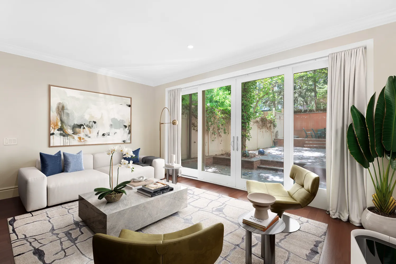 a backyard of a house with barbeque oven