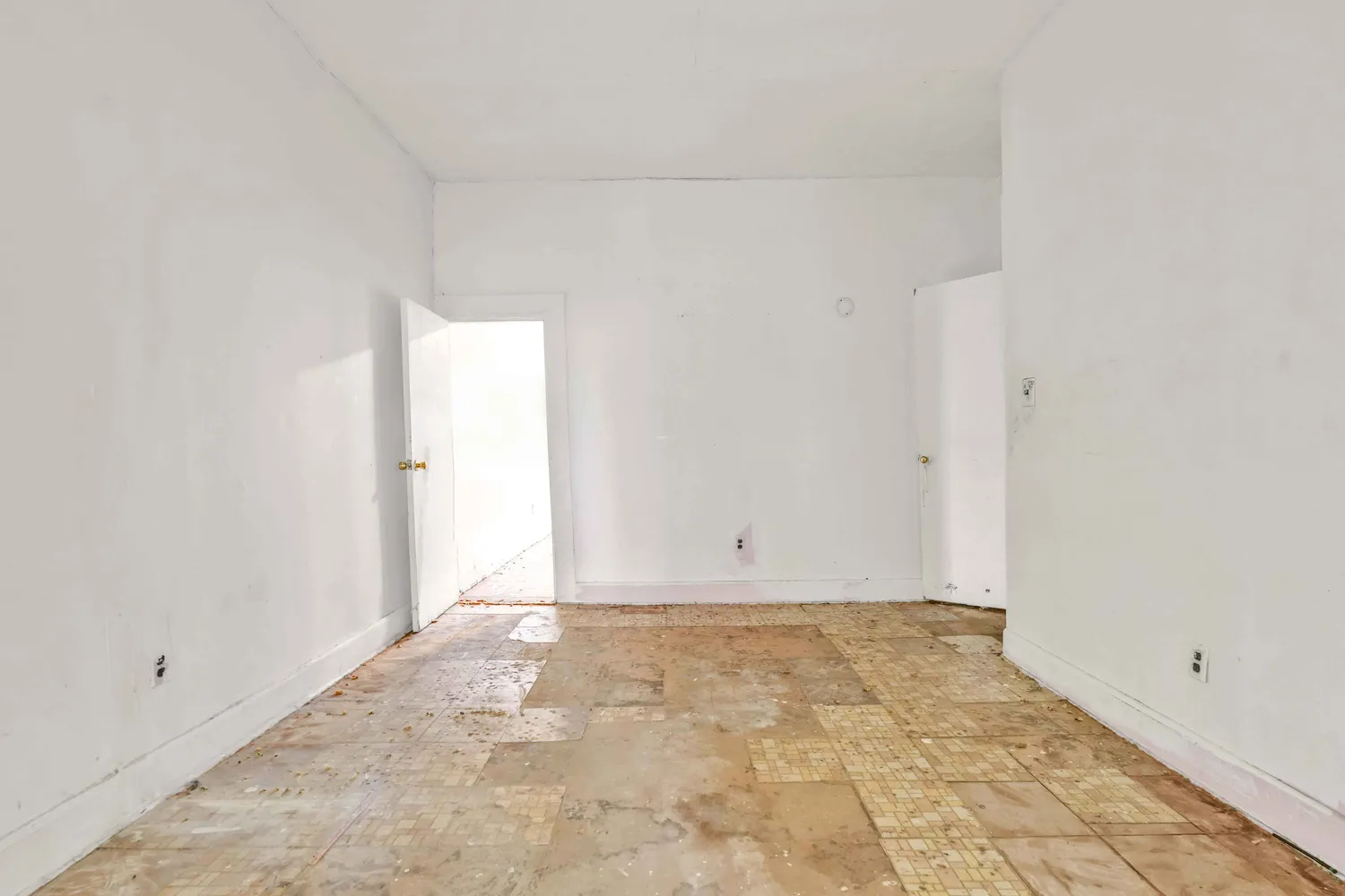 a kitchen with granite countertop cabinets and white appliances