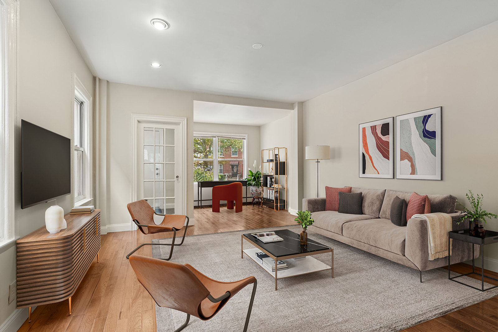 181 Terrace Place Brooklyn, NY 11218 - Photo 2 of 22 a living room with furniture potted plant and a flat screen tv