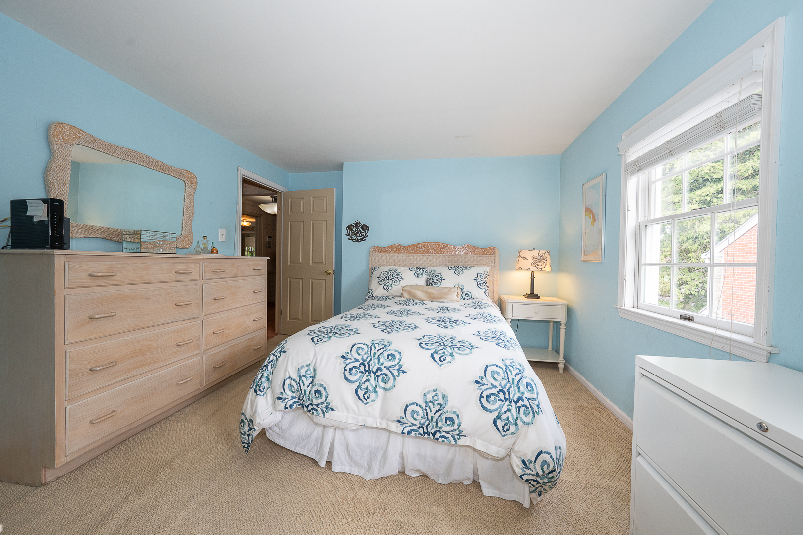 519 Mercer Road Merion Station, PA 19066 - Photo 32 of 58 a bedroom with a large bed and a dresser