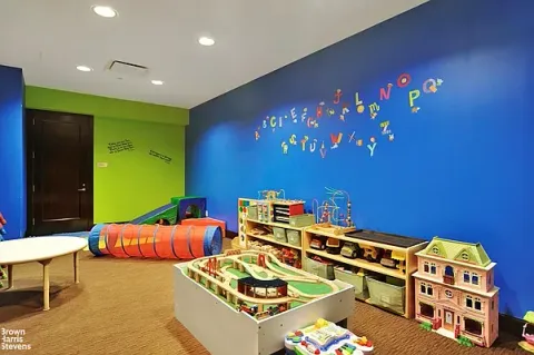 a room with furniture and a flat screen tv