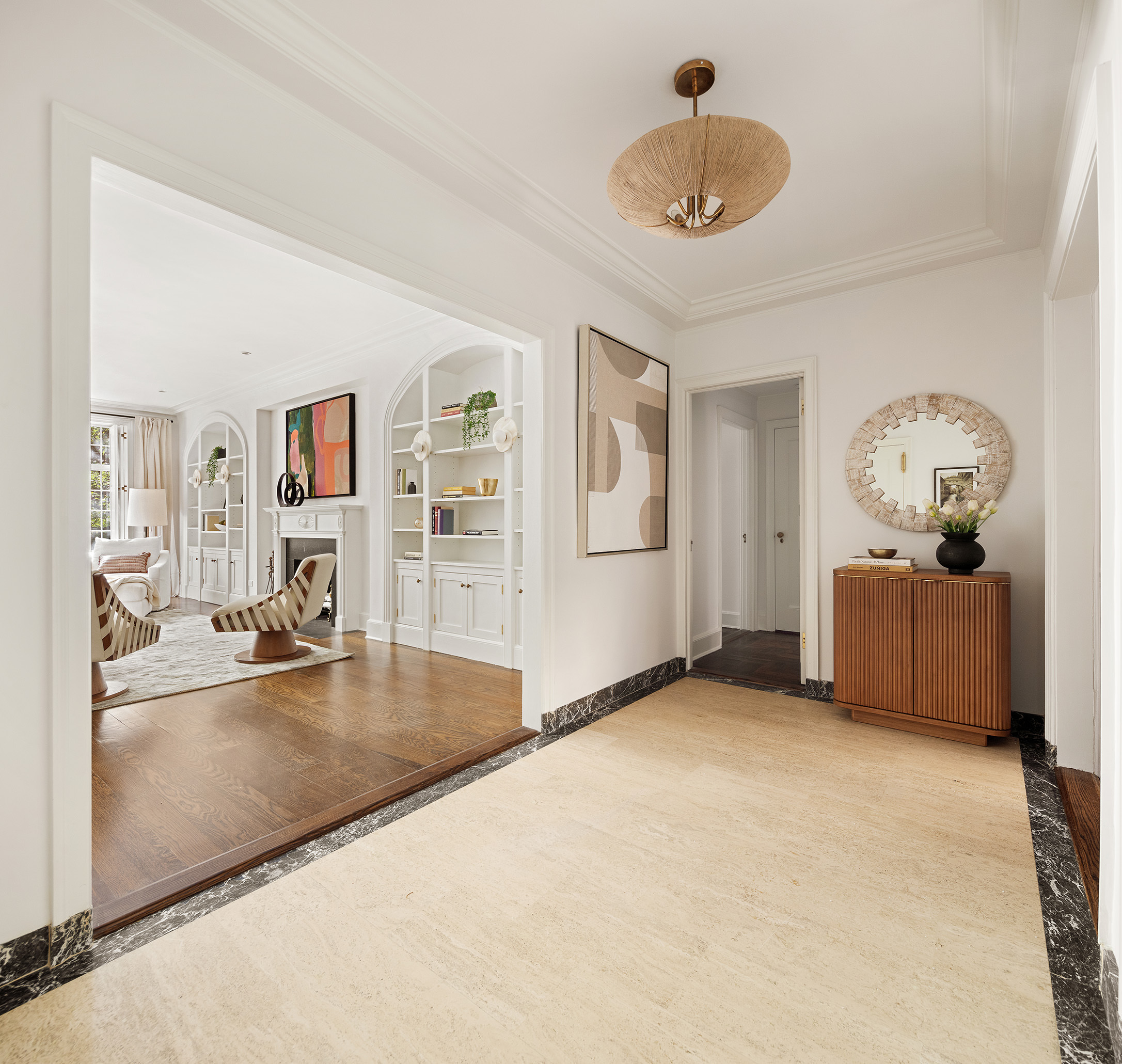 115 East 67th Street, Unit 3C Manhattan, NY 10065 - Photo 5 of 21 a view of a livingroom with a furniture and cabinet