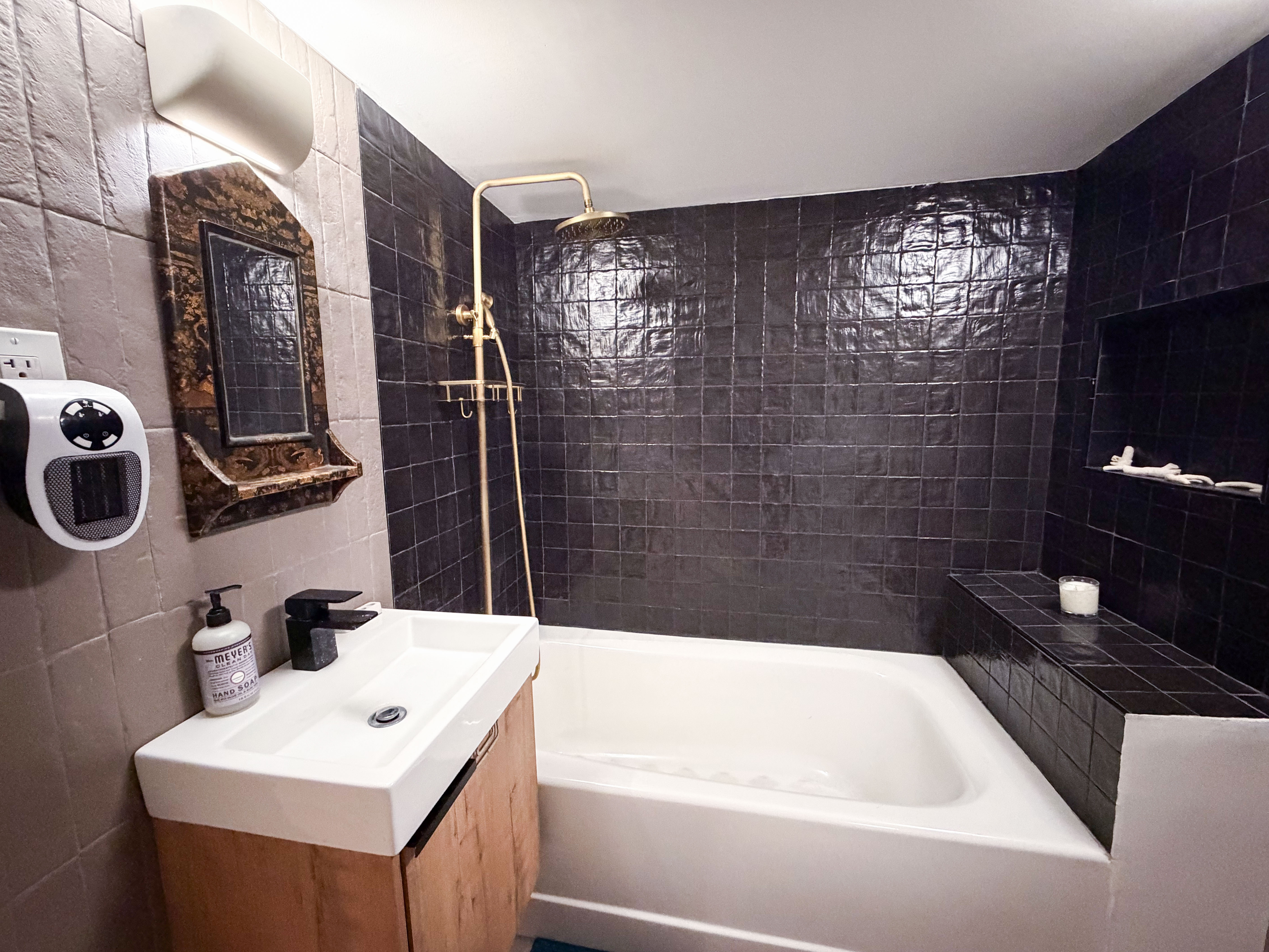 206 East 7th Street, Unit G Manhattan, NY 10009 - Photo 11 of 22 a bathroom with a sink a toilet and shower