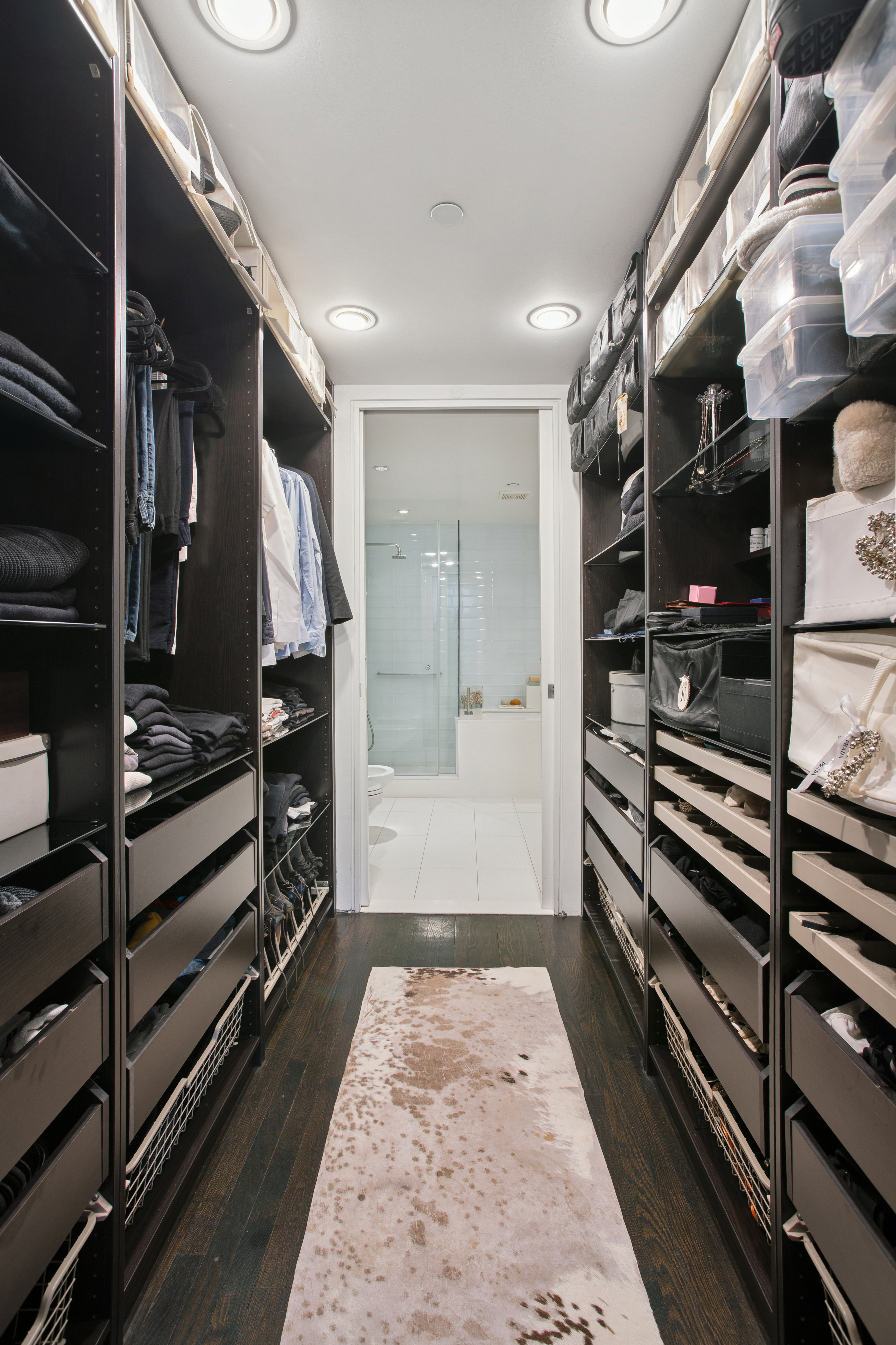 716 Broadway Manhattan, NY 10003 - Photo 11 of 15 a bathroom with glass door shower and a sink