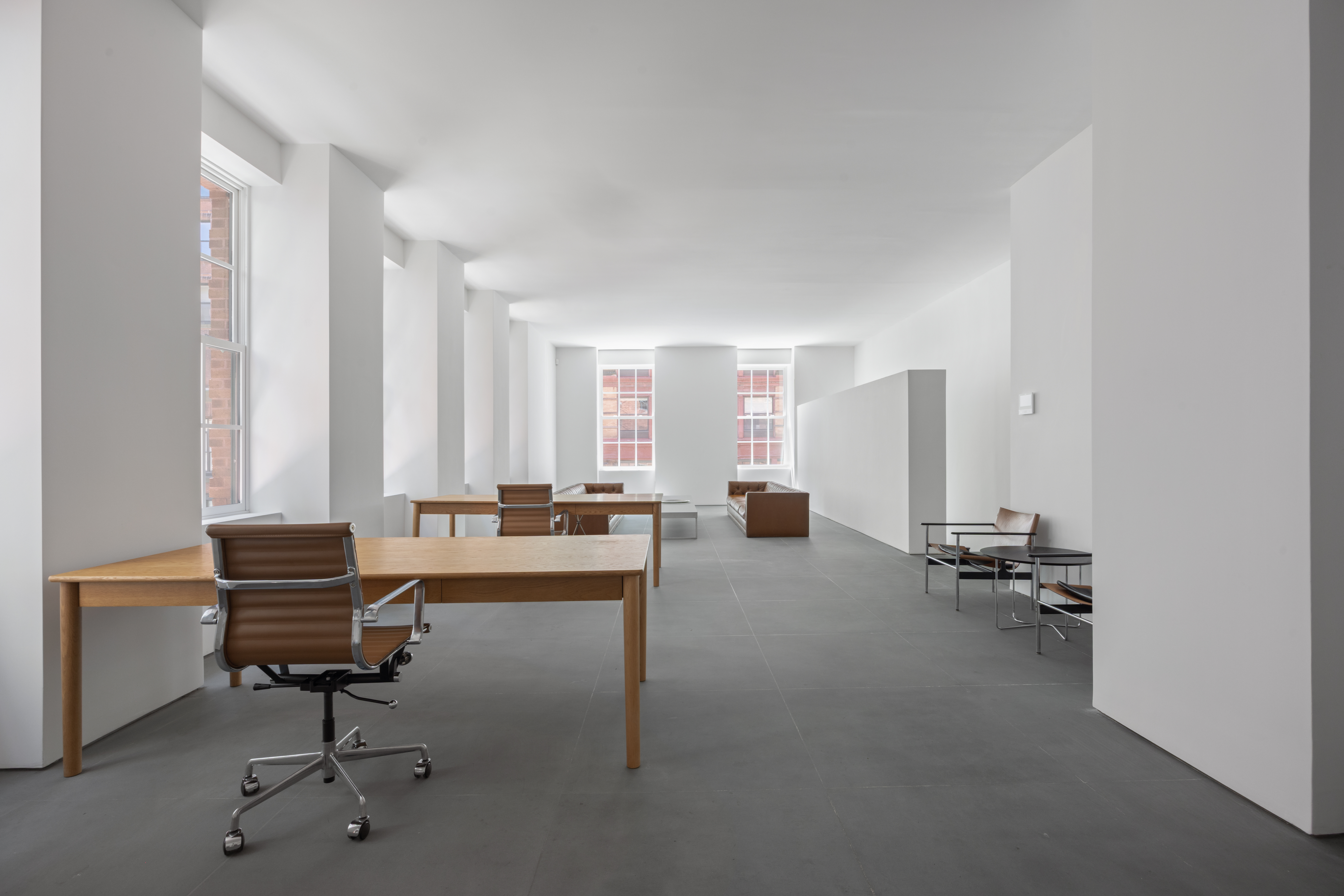 9 Jay Street Manhattan, NY 10013 - Photo 8 of 32 a view of a workspace with furniture and a window