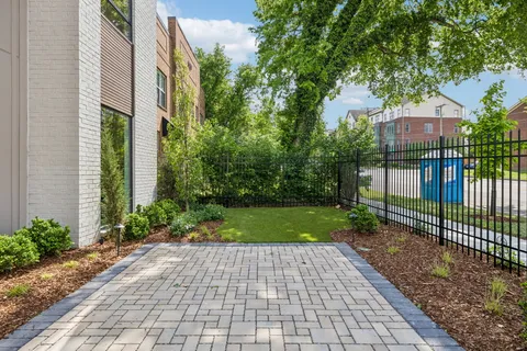 a front view of a house having yard