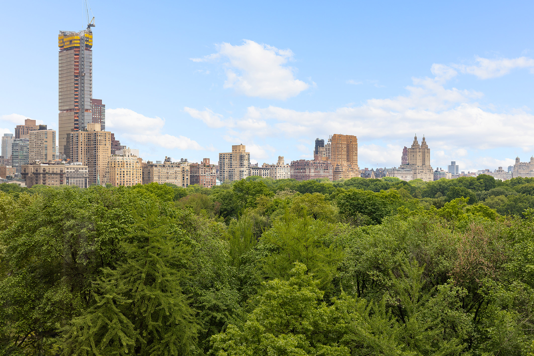 1 Central Park South, Unit 8010203 Manhattan, NY 10019 - Photo 30 of 45 a view of a city with tall buildings