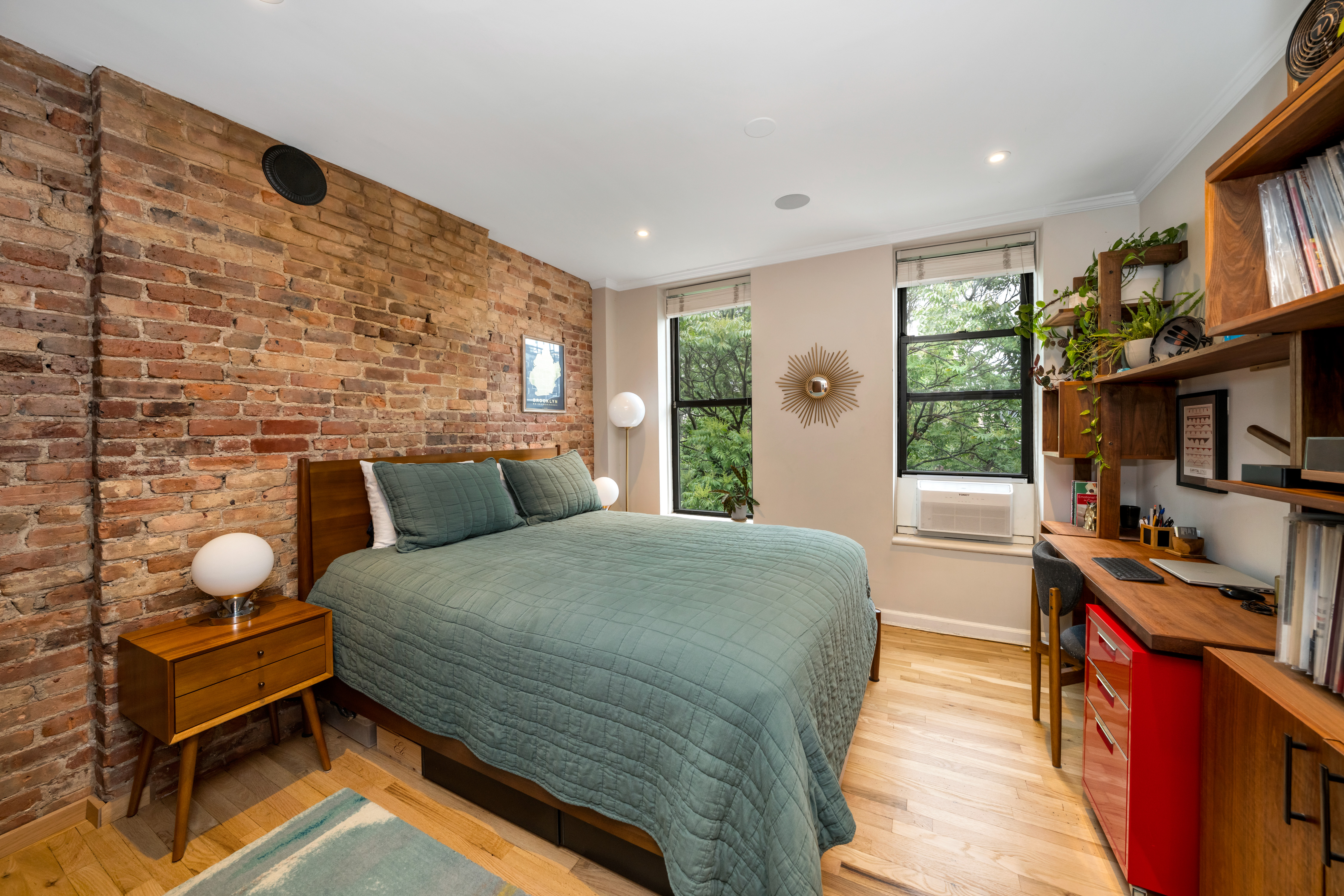 535 Clinton Street, Unit 4A Brooklyn, NY 11231 - Photo 8 of 10 a bed room with a bed and a window