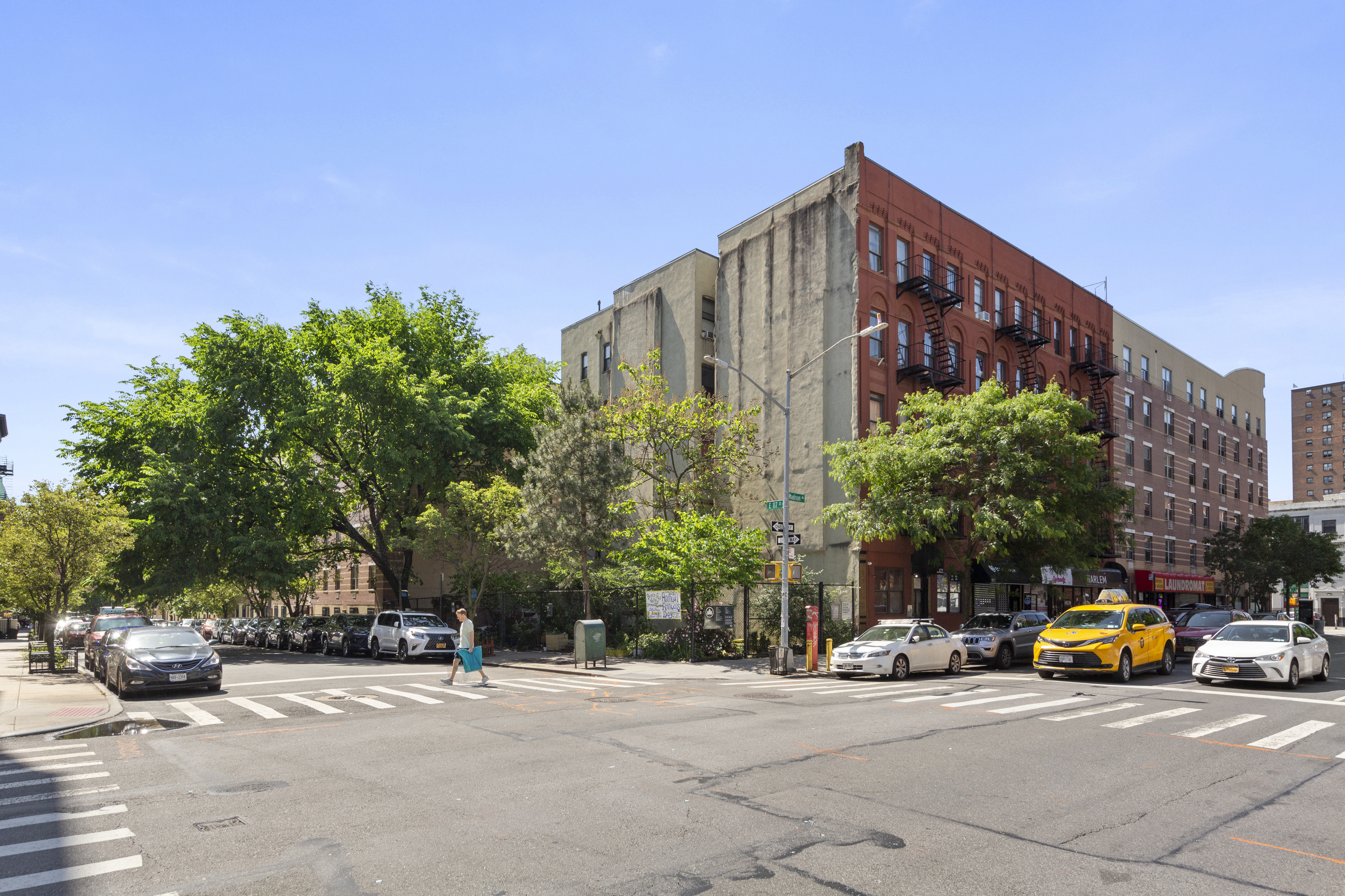 1777 Madison Avenue, Unit 24 Manhattan, NY 10035 - Photo 18 of 20 a view of street with parked cars