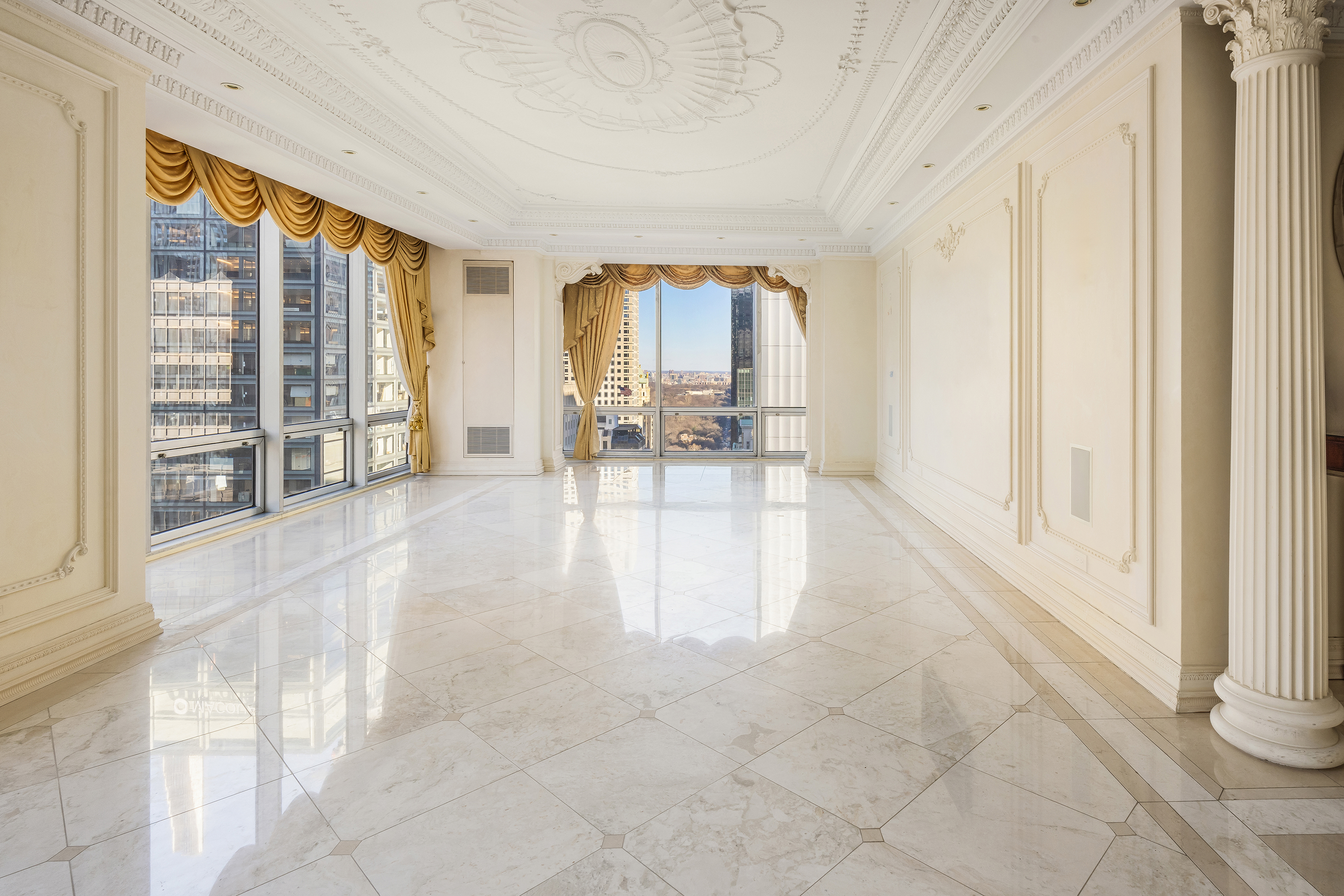 641 5th Avenue, Unit 27A Manhattan, NY 10022 - Photo 14 of 29 a lobby with furniture and floor to ceiling window