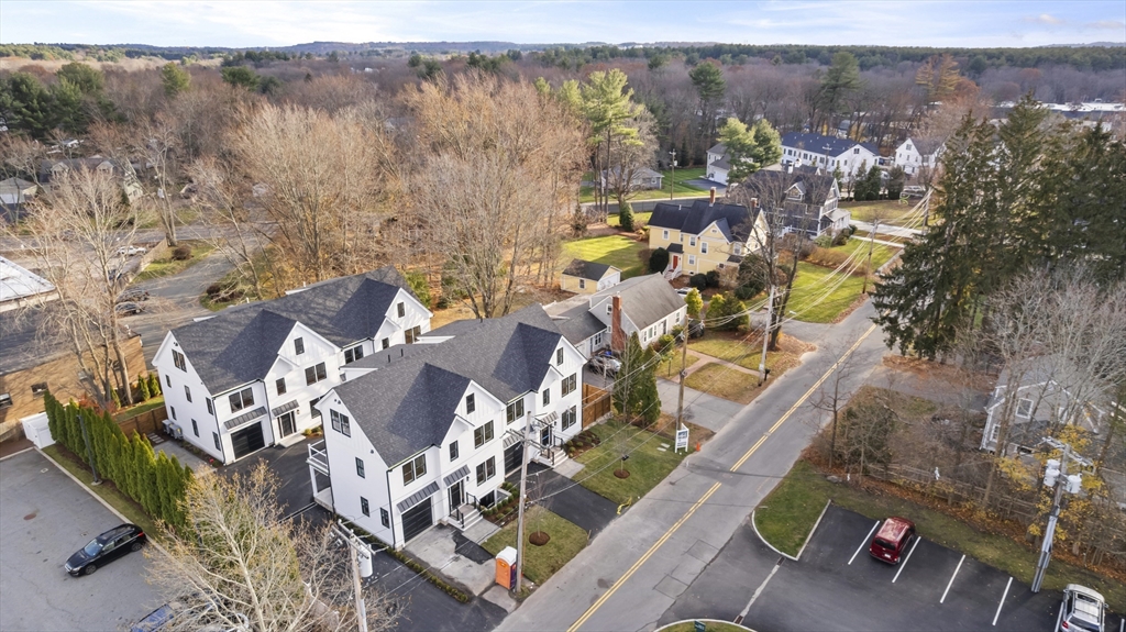 10 Webber Avenue, Unit 3C Bedford, MA 01730 - Photo 28 of 36 an aerial view of multiple house with yard