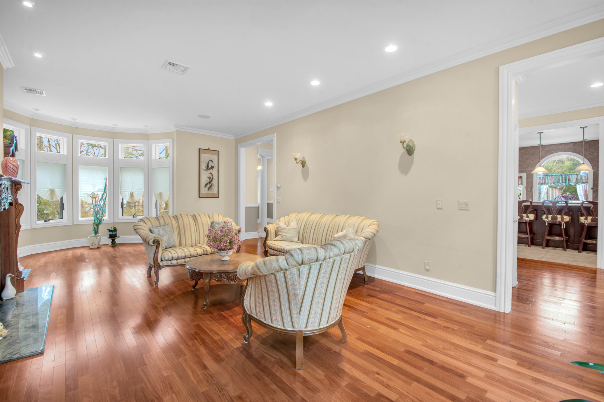 68 Circle Road Staten Island, NY 10304 - Photo 4 of 38 a living room with furniture and a wooden floor