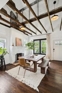 a workspace with furniture window and wooden floor