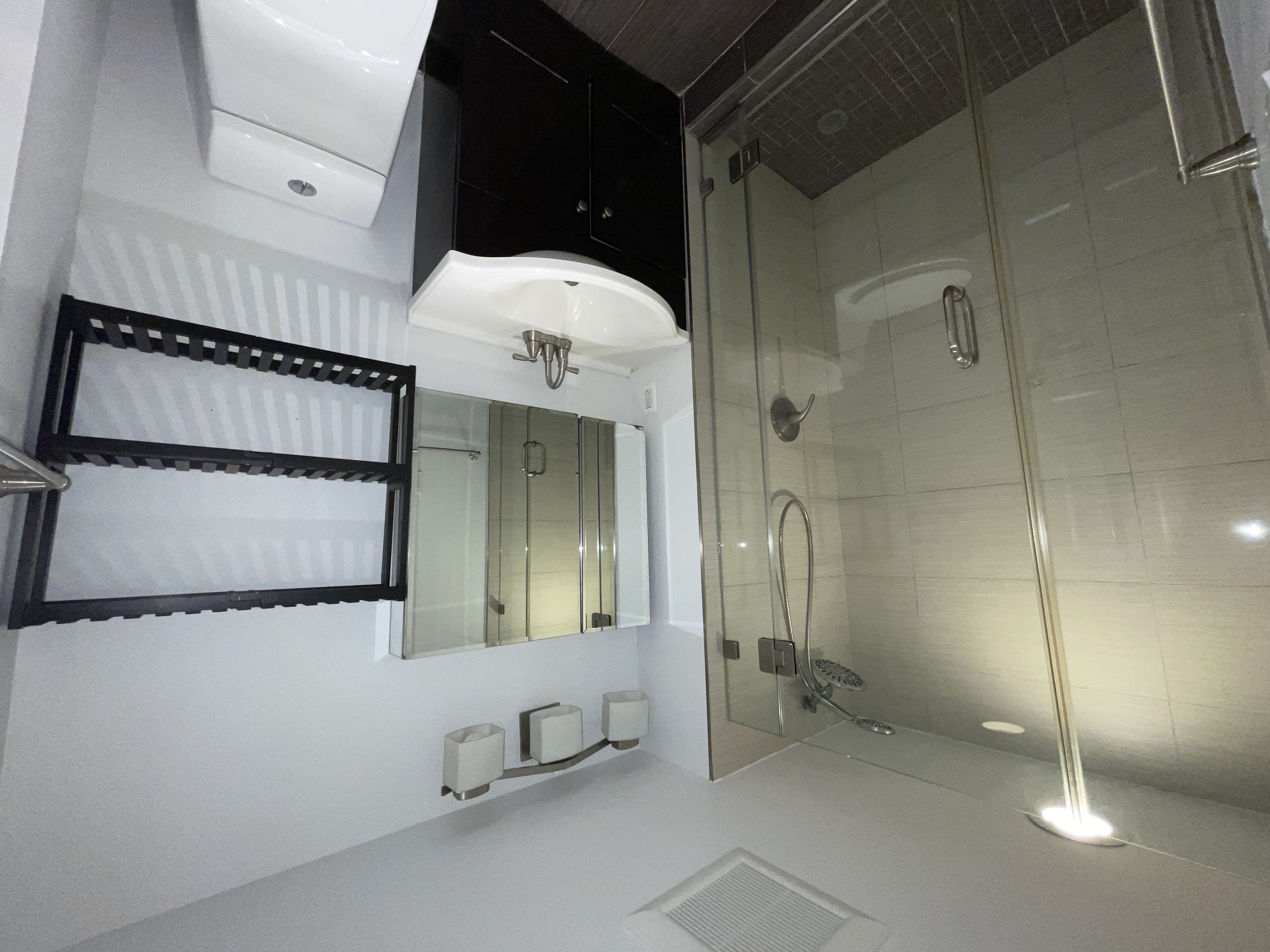 19-14 Astoria Park South, Unit 1B Queens, NY 11102 - Photo 8 of 11 a bathroom with a sink toilet and shower