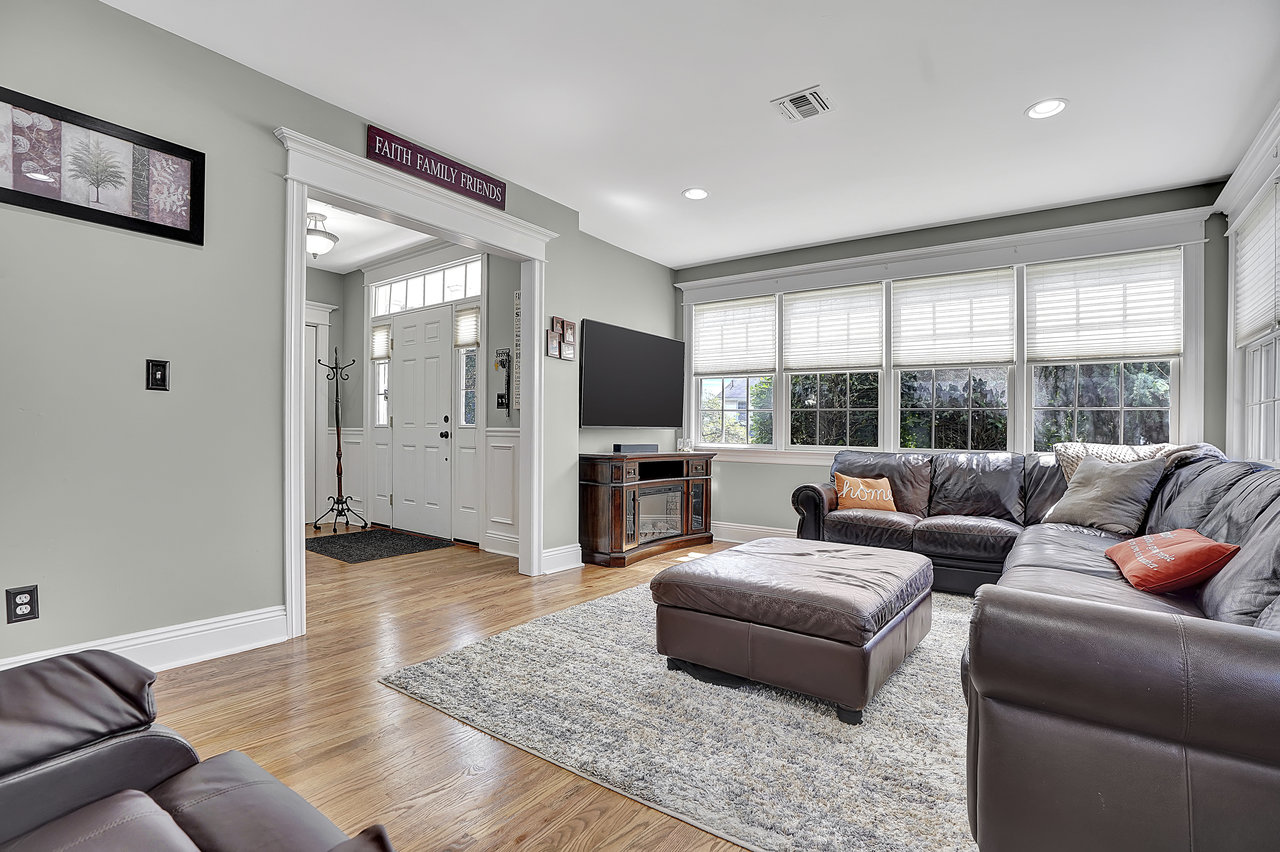 266 Feronia Way Rutherford, NJ 07070 - Photo 5 of 41 a living room with furniture and a flat screen tv