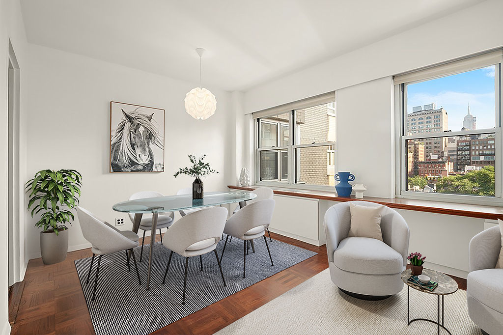 20 East 9th Street, Unit 12X Manhattan, NY 10003 - Photo 5 of 26 a living room with furniture and a large window