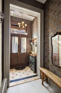 a kitchen with stainless steel appliances granite countertop a stove and a refrigerator