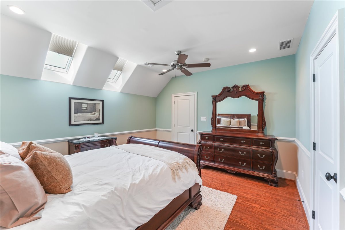 248 Valley Ridge Road Haverford, PA 19041 - Photo 30 of 44 a bedroom with a bed and a chandelier